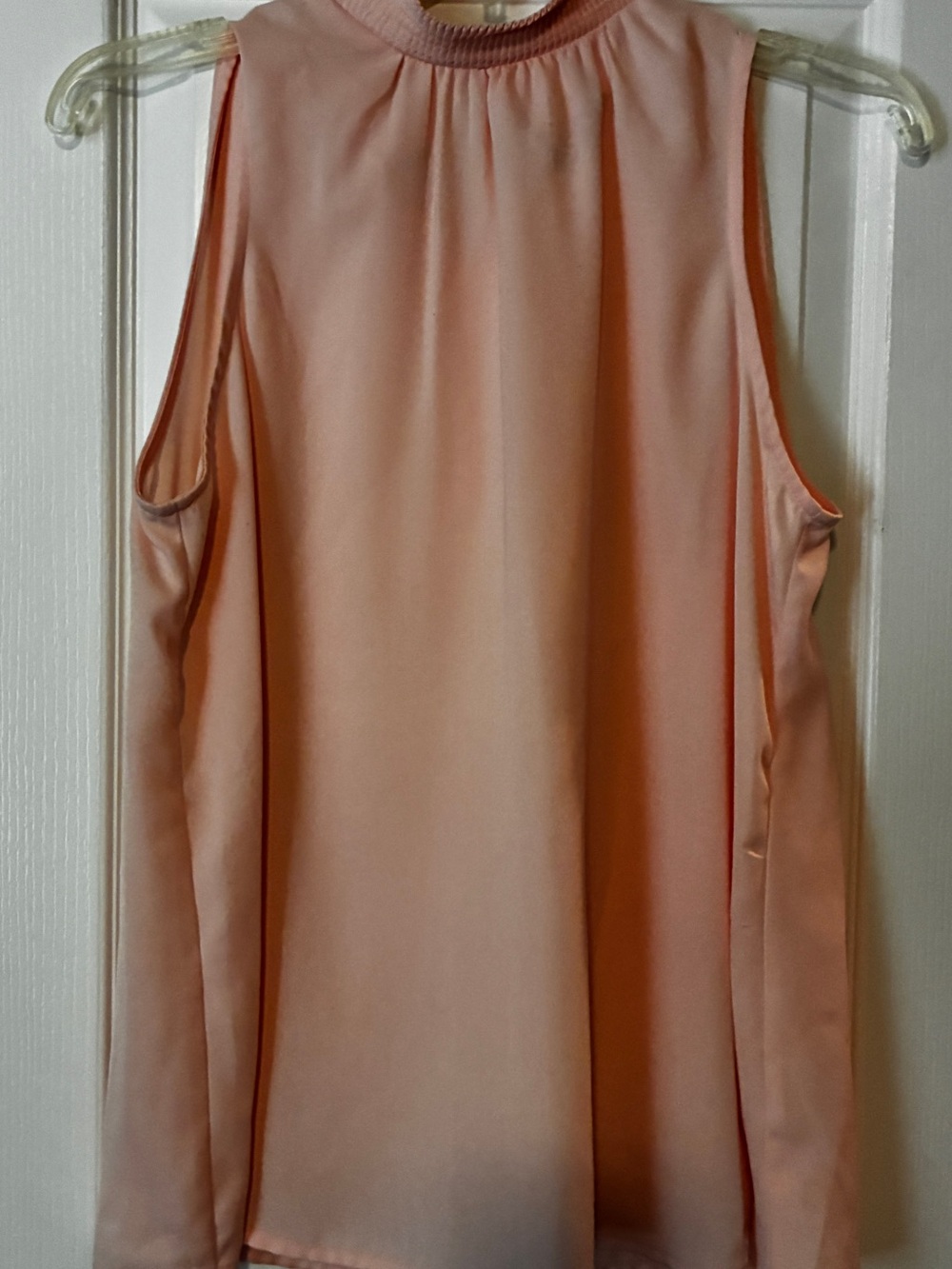 Sleeveless pink high-Neck Blouse